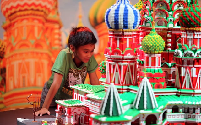 Kid looking at LEGO Display